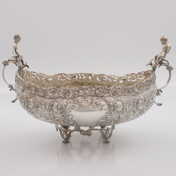 An embossed and chiseled silver 900 centerpiece, 20th century