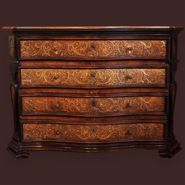 A North Italian walnut and gilded pastiglia chest of drawers, Milan, 17th century