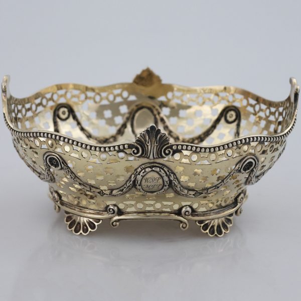 A Victorian sterling silver and silver-gilt basket, Charles Stuart Harris, London, 1898