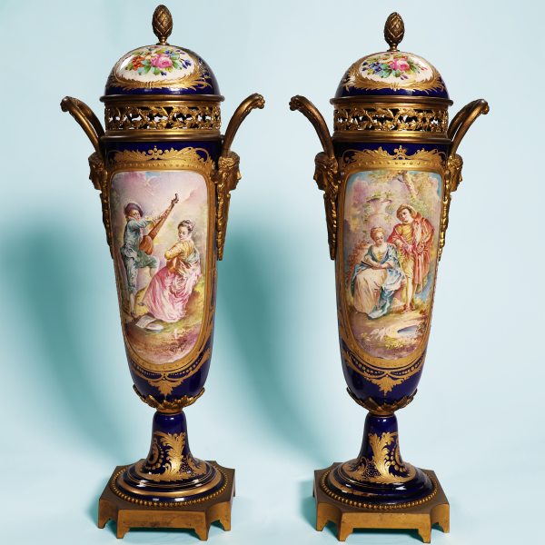 A French pair of vases, gilt-bronze mounted. igned Rochette. Late 19th century