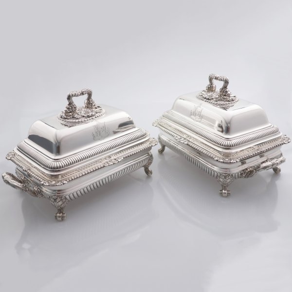 A pair of George III sterling silver entrée dishes and covers with stands, Paul Storr, London, 1817