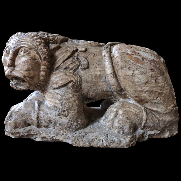 A lumachella marble recumbent lion, romanesque sculptor, 13th century