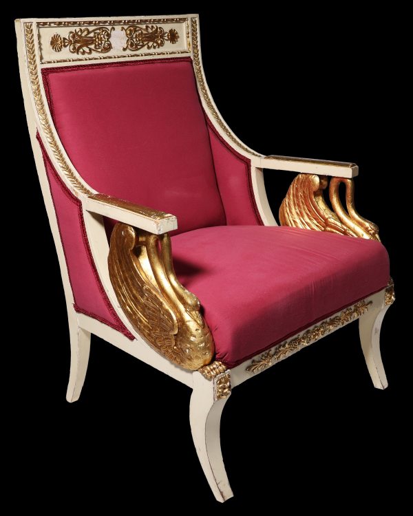 An Italian sofa with two lacquered and gilded armchairs, 19th century