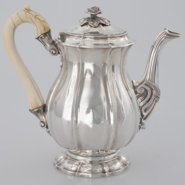 A George III sterling silver teapot with ivory handle, William Eaton, London, 1804