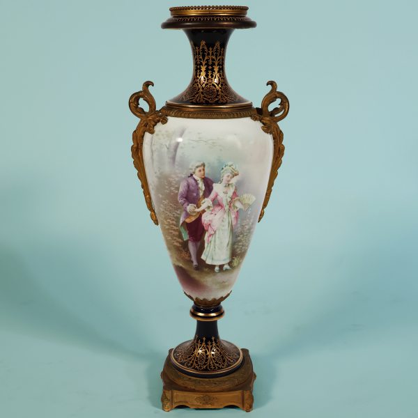 A French vase depicting gallant scenes, gilt-bronze mounted. Signed Daniel. Late 19th century