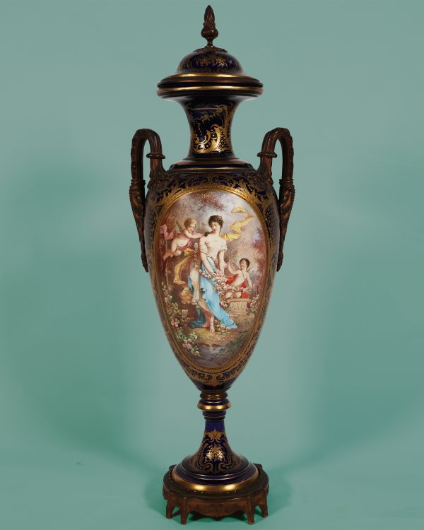 A French vase in the Sèvres style, gilt-bronze mounted. Painted signed Poitevin. Late 19th century